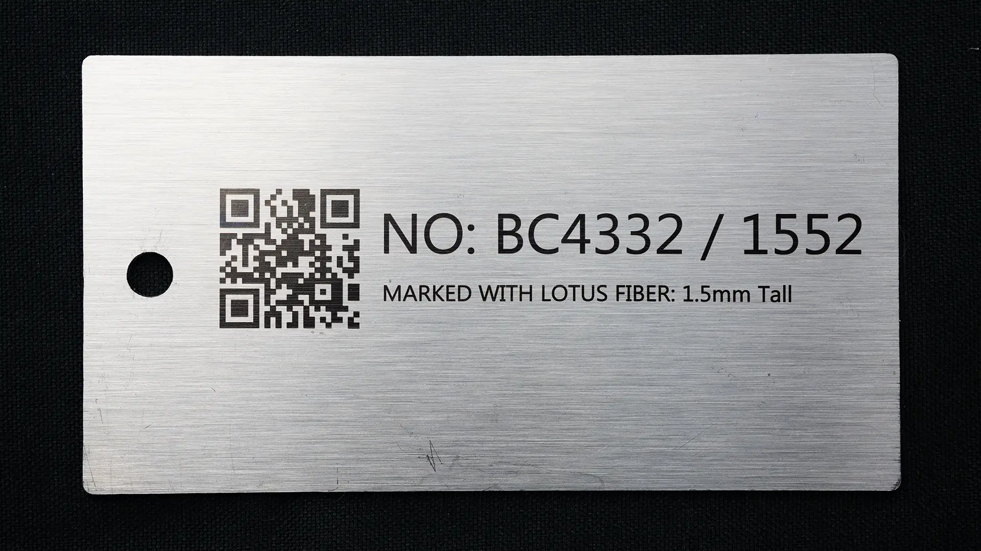 Lotus Fiber engraved stainless steel tag for traceability