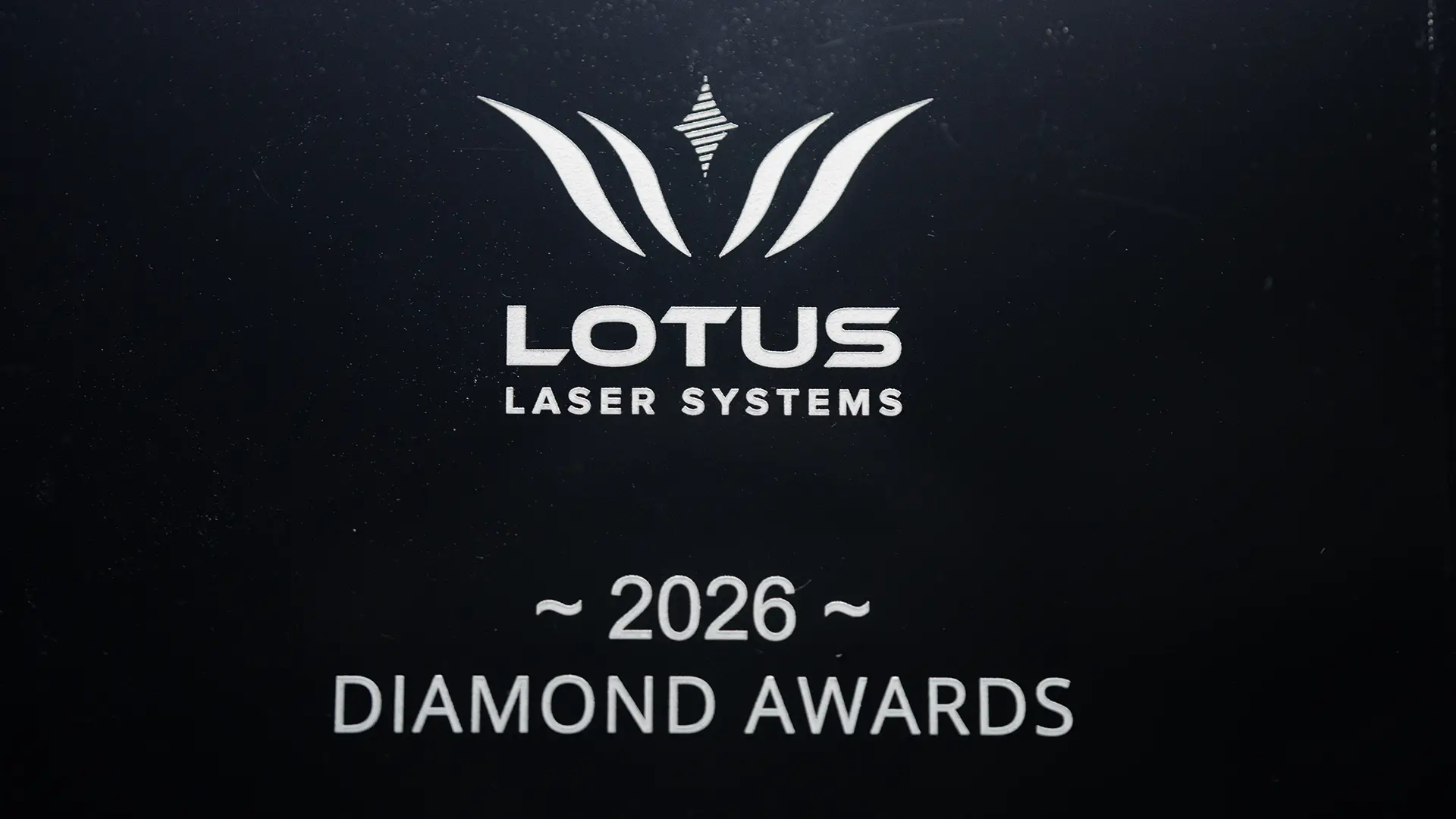 Lotus UV Engraving on a Glass Trophy